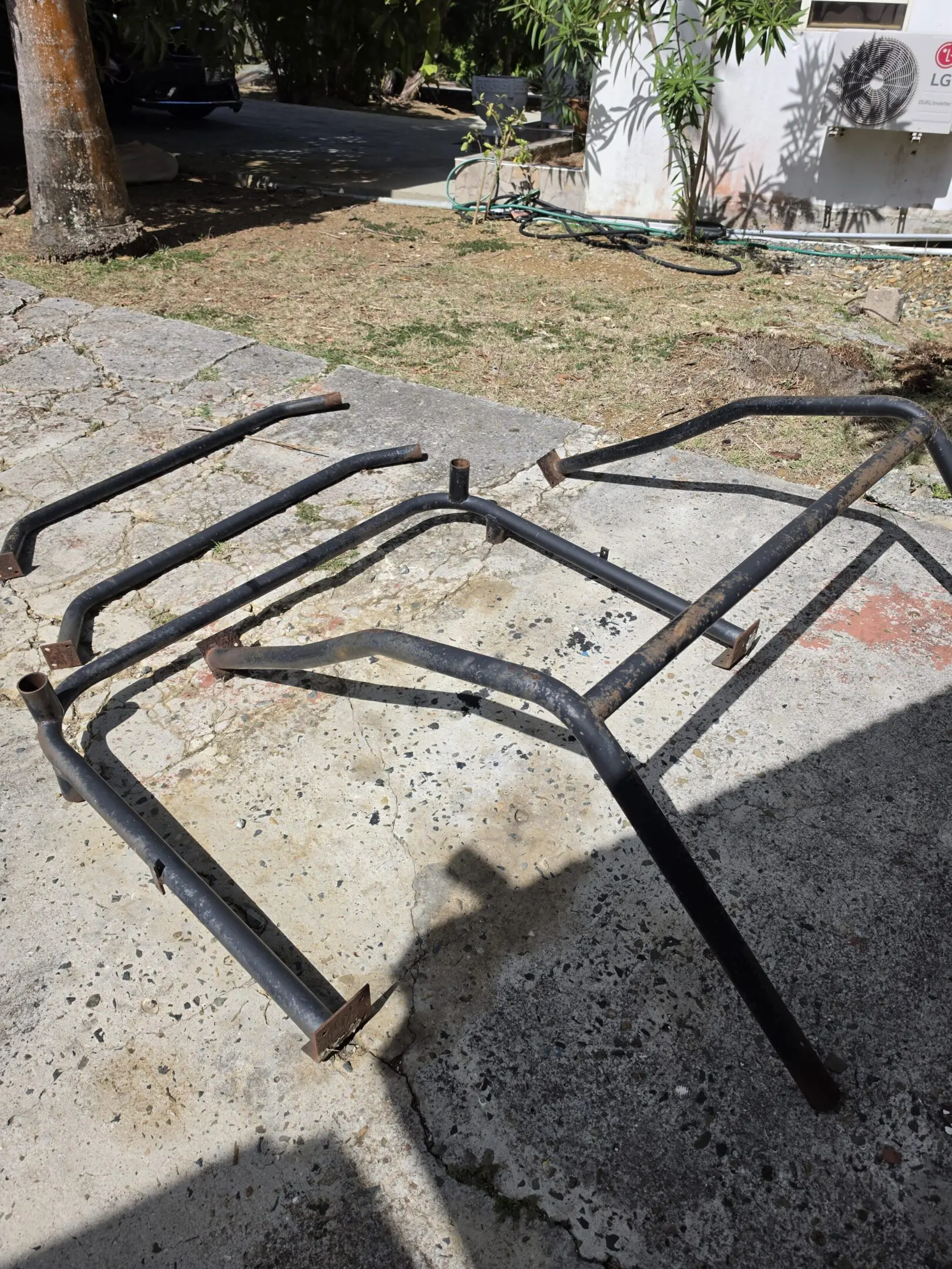 Black tubular metal car roof rack frame